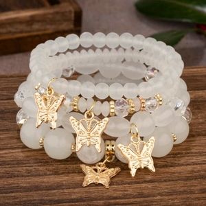 White Clear Stacked Beads & Gold Butterfly Charms Bracelet